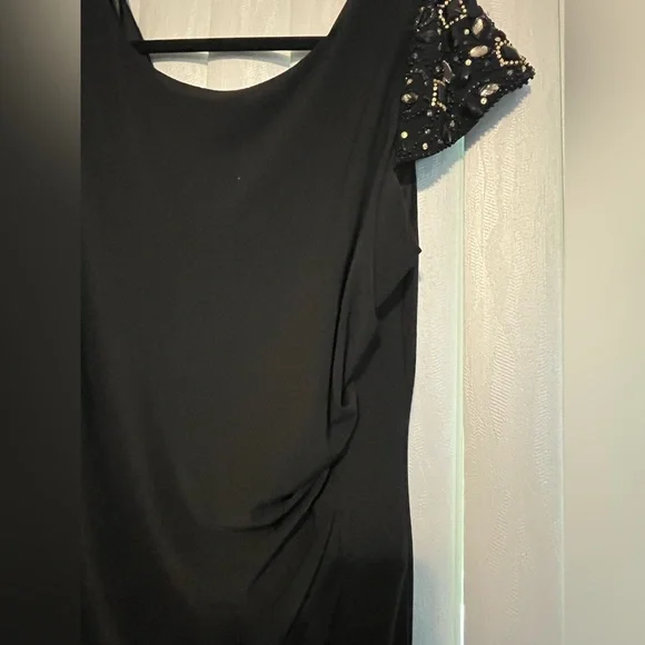 Elegant Black Dress with Embellished Sleeves - Picture 6 of 10